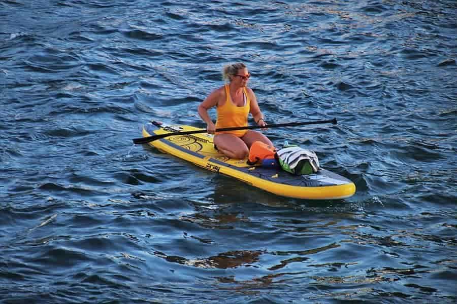 How to close a dry bag for paddle boarding