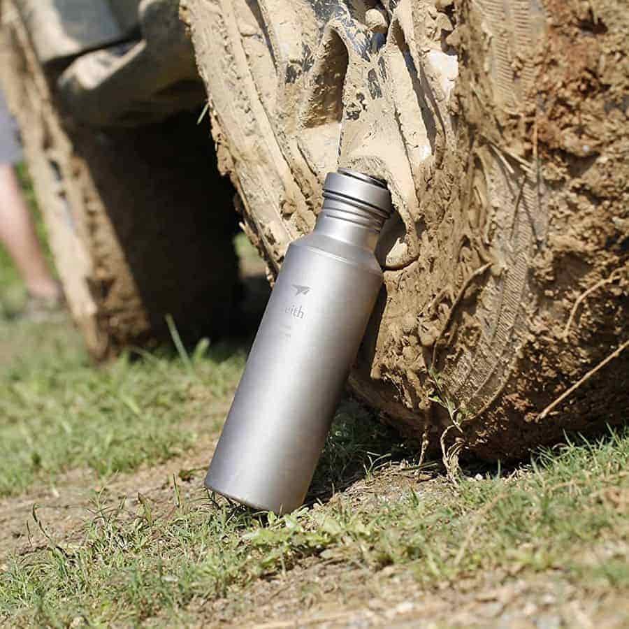 Keith titanium bottle leaning aganst tyre