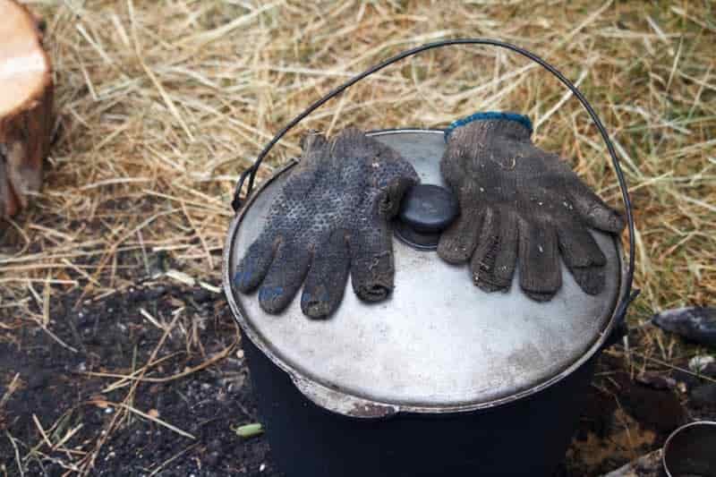 campfire gloves on cooking pot