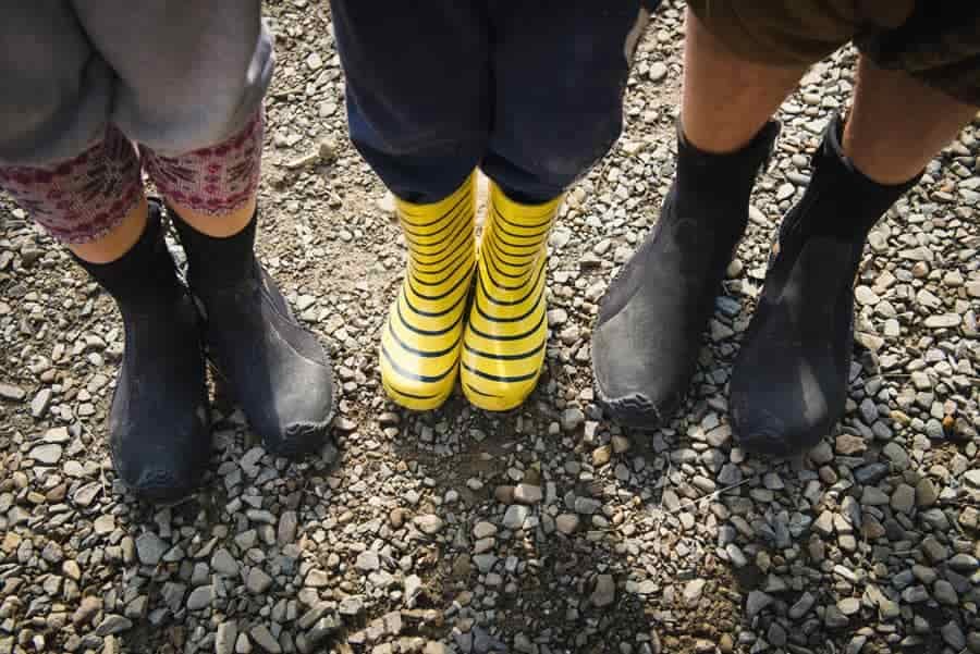 Neoprene socks and gum boots for river hiking