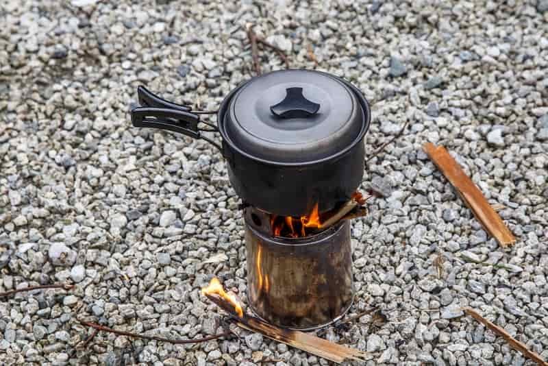 multifuel stove boiling pot of water