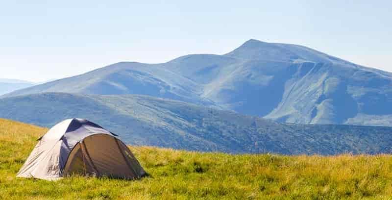 Leaving a Tent Near a Hiking Trail