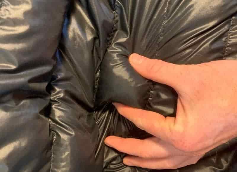 clump of down in jacket baffle after washing