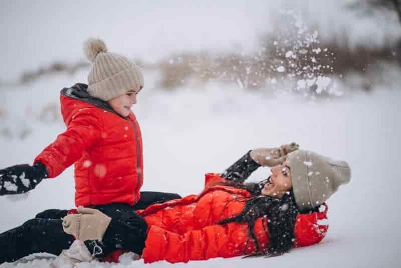 down and synthetic jacket comparison in cold weather snow