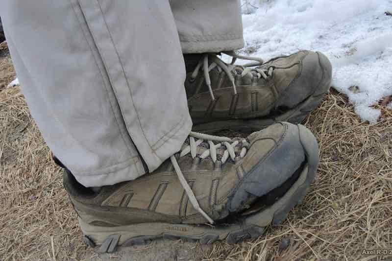 Hiking boot with damaged rand
